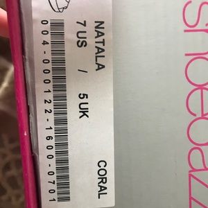 Pair of 6in heels coral in color with platform toe